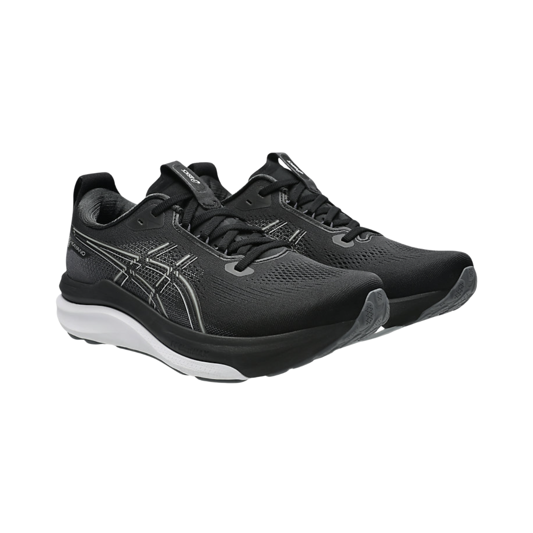 ASICS Men’s Gel-Kayano 33 in Black/White side view showcasing the engineered mesh upper, FF BLAST™ MAX and FF BLAST™ PLUSH cushioning, Rearfoot PureGEL™ technology, FLUIDSUPPORT™ stability system, and Hybrid ASICSGRIP™ outsole designed for premium stability, cushioned comfort, and everyday running performance.