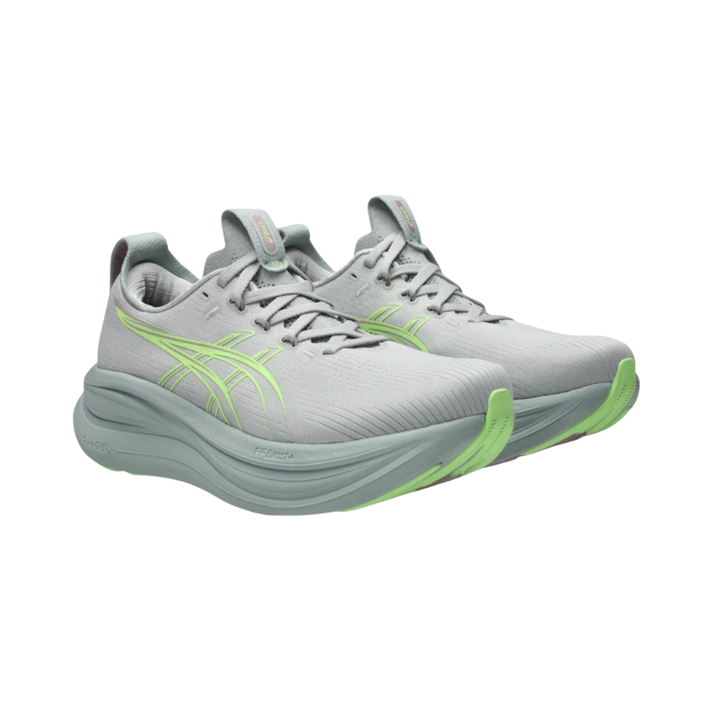 ASICS Women’s Gel-Nimbus 28 in Cloud Grey/Illuminate Green side view showcasing the engineered knit upper, PureGEL™ technology, FF BLAST™ PLUS cushioning, maximum cushioning platform, and HYBRID ASICSGRIP™ outsole designed for plush comfort, smooth transitions, and everyday running and walking.