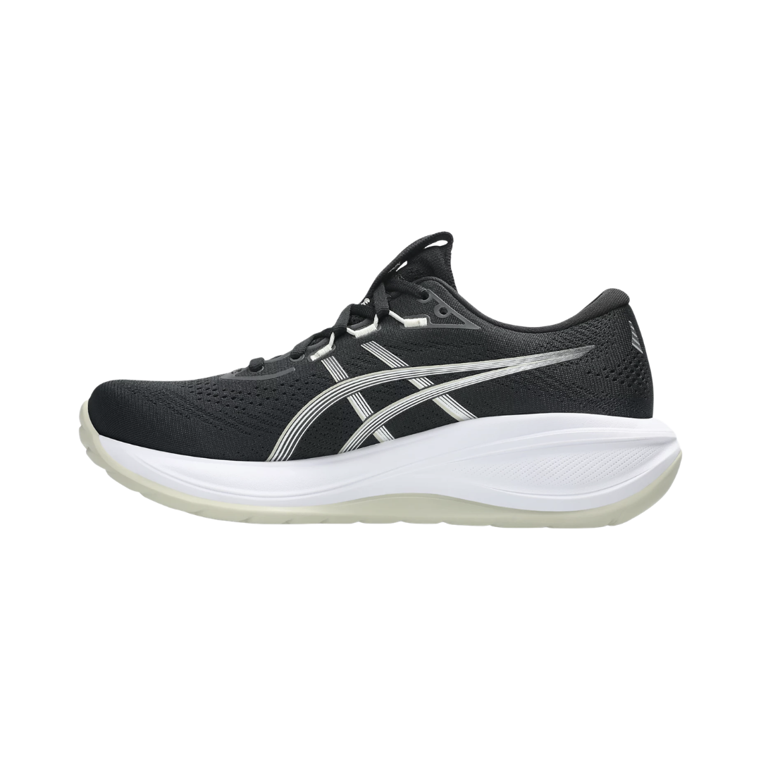 ASICS Women’s Gel-Cumulus 28 in Black/White side view showcasing the engineered mesh upper, FF BLAST™ MAX cushioning, PureGEL™ technology, high-cushion neutral running shoe design, FLUIDRIDE™ outsole, and AHAR™ LO heel rubber built for smooth transitions, everyday running, and walking comfort.