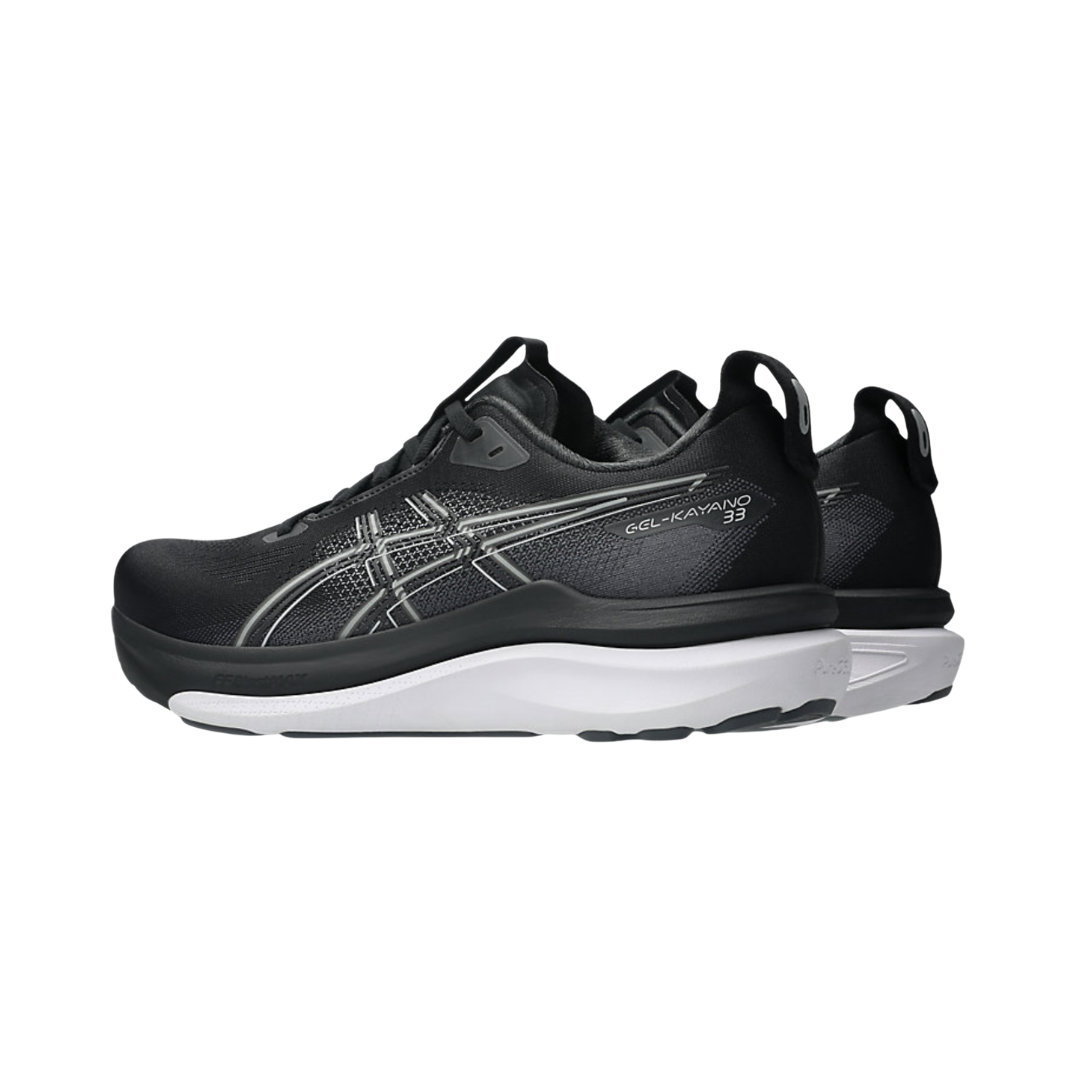 ASICS Men’s Gel-Kayano 33 in Black/White rear heel view displaying the Rearfoot PureGEL™ cushioning, supportive heel counter, padded collar, reflective details, and stable heel platform engineered for shock absorption, motion control, and smooth heel-to-toe transitions.