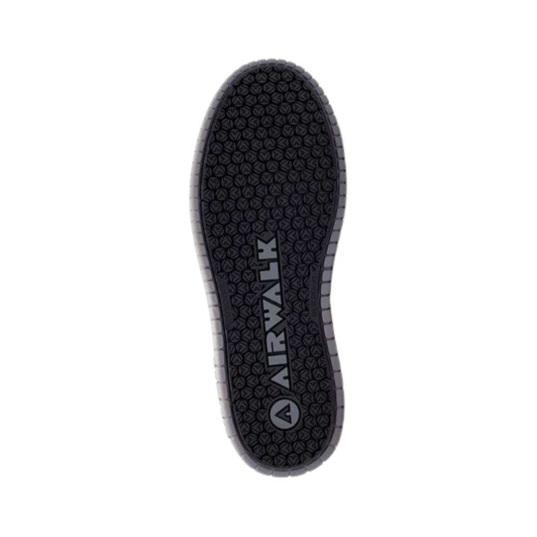 Airwalk Men's Camino Low ESD Composite Toe safety shoe in Black/Grey bottom view featuring a durable slip-resistant rubber outsole with multi-directional traction pattern designed to provide dependable grip, stability, and workplace safety on a variety of surfaces.