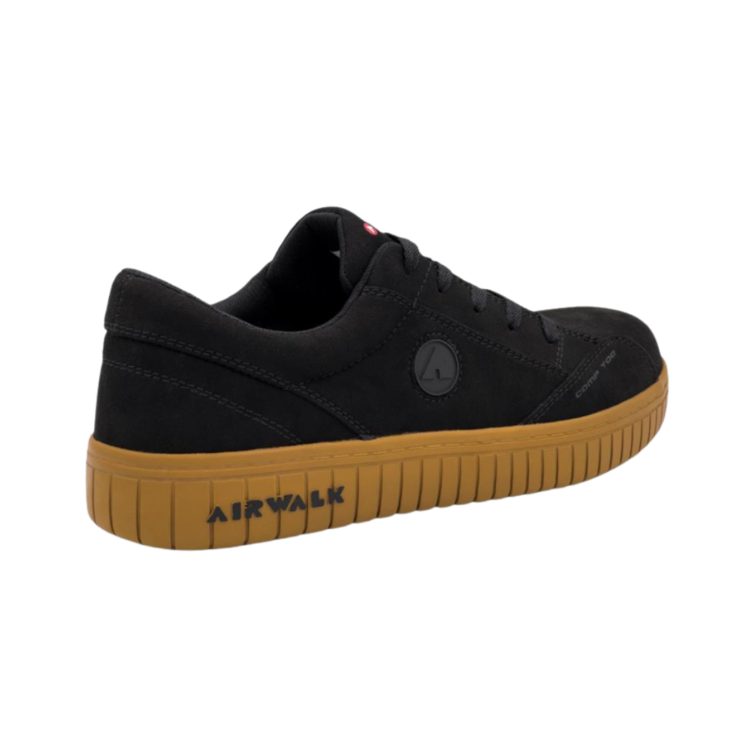 Airwalk Men's Camino Low Composite Toe safety shoe in Black/Gum rear heel view displaying the padded collar, reinforced heel counter, supportive heel cushioning, and slip-resistant gum outsole designed for stability and all-day workplace comfort.