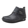 Side view of the Women’s Alegria Caiti in Oiled Ash, highlighting the premium leather upper, stylish ankle boot silhouette, adjustable hook-and-loop strap, and supportive mild rocker outsole.