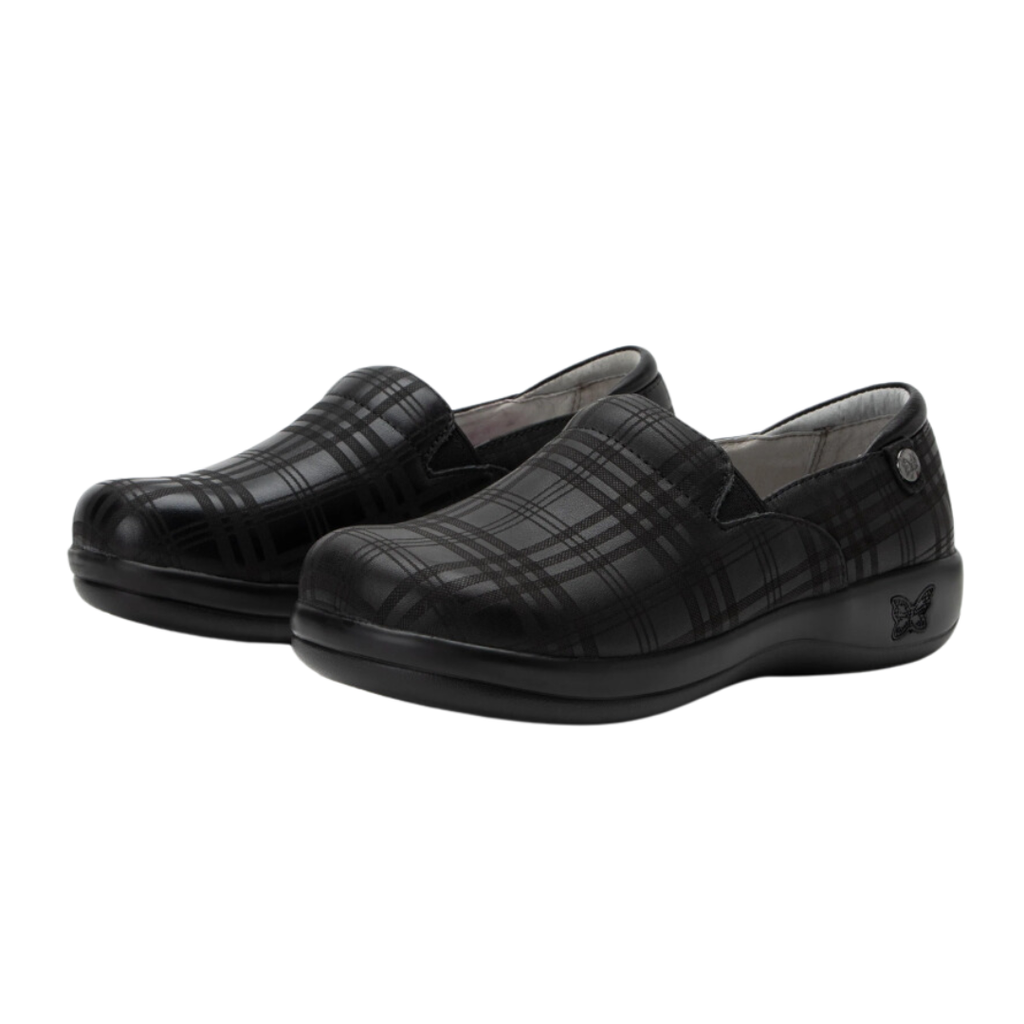 Side view of the Women’s Alegria Keli in Plaid to Meet You, highlighting the stain-resistant leather upper, mild rocker sole for natural motion, and slip-resistant outsole designed for long hours on your feet.