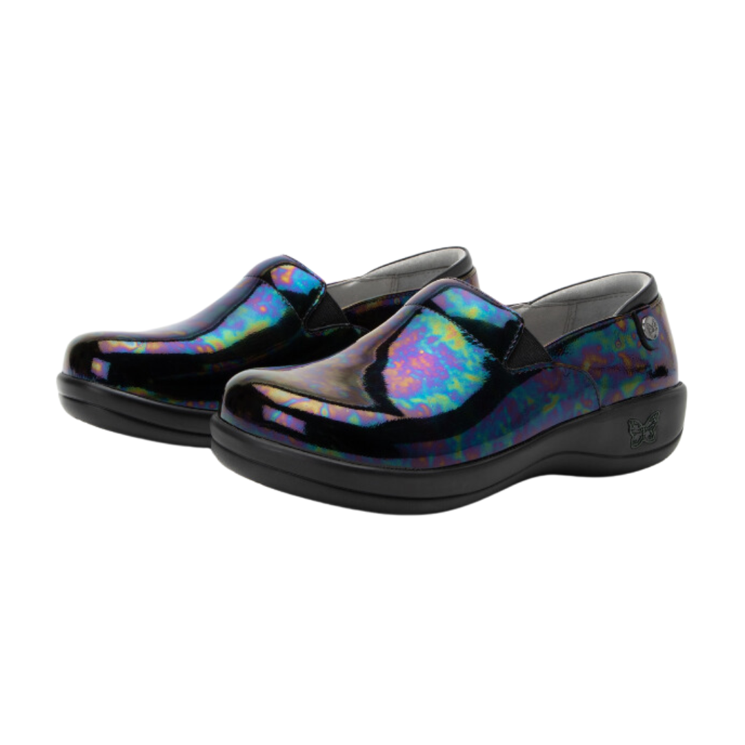 Side view of the Women’s Alegria Keli in Slickery Patent, highlighting the stain-resistant leather upper, mild rocker sole for natural motion, and slip-resistant outsole designed for long hours on your feet.