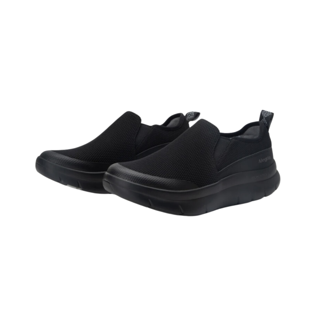 Alegria Women’s Shift Lead Slip-On Athletic Shoe in Black Mesh side view showcasing the breathable mesh upper, lightweight slip-on design, cushioned EVA midsole, padded interior, and slip-resistant rubber outsole built for all-day professional comfort and support.