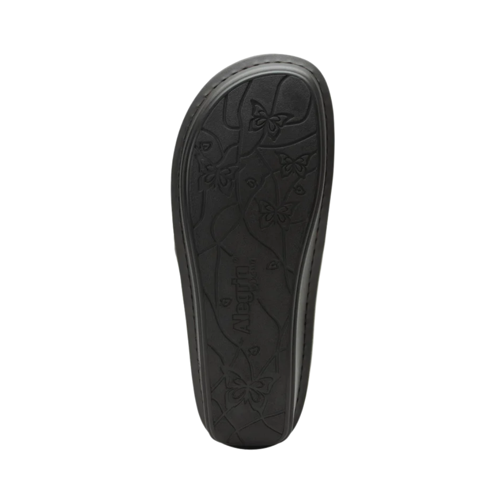 Alegria Women’s Brenna Slip-On in Oiled Brown bottom view featuring a slip-resistant rubber outsole with mild rocker design engineered to encourage natural walking motion, improve stability, and reduce joint pressure on a variety of surfaces.