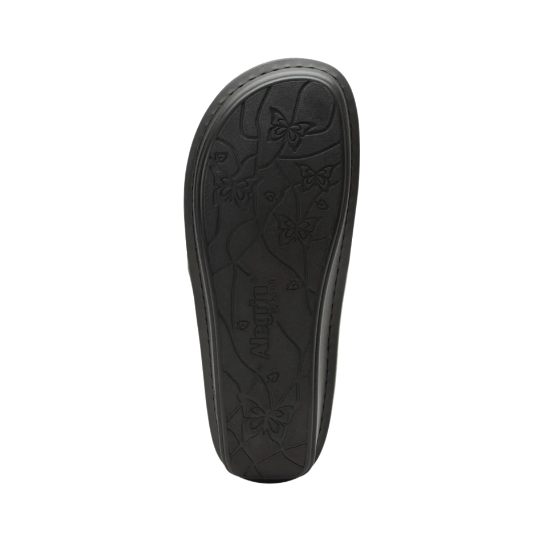 Alegria Women’s Brenna Slip-On in Oiled Brown bottom view featuring a slip-resistant rubber outsole with mild rocker design engineered to encourage natural walking motion, improve stability, and reduce joint pressure on a variety of surfaces.