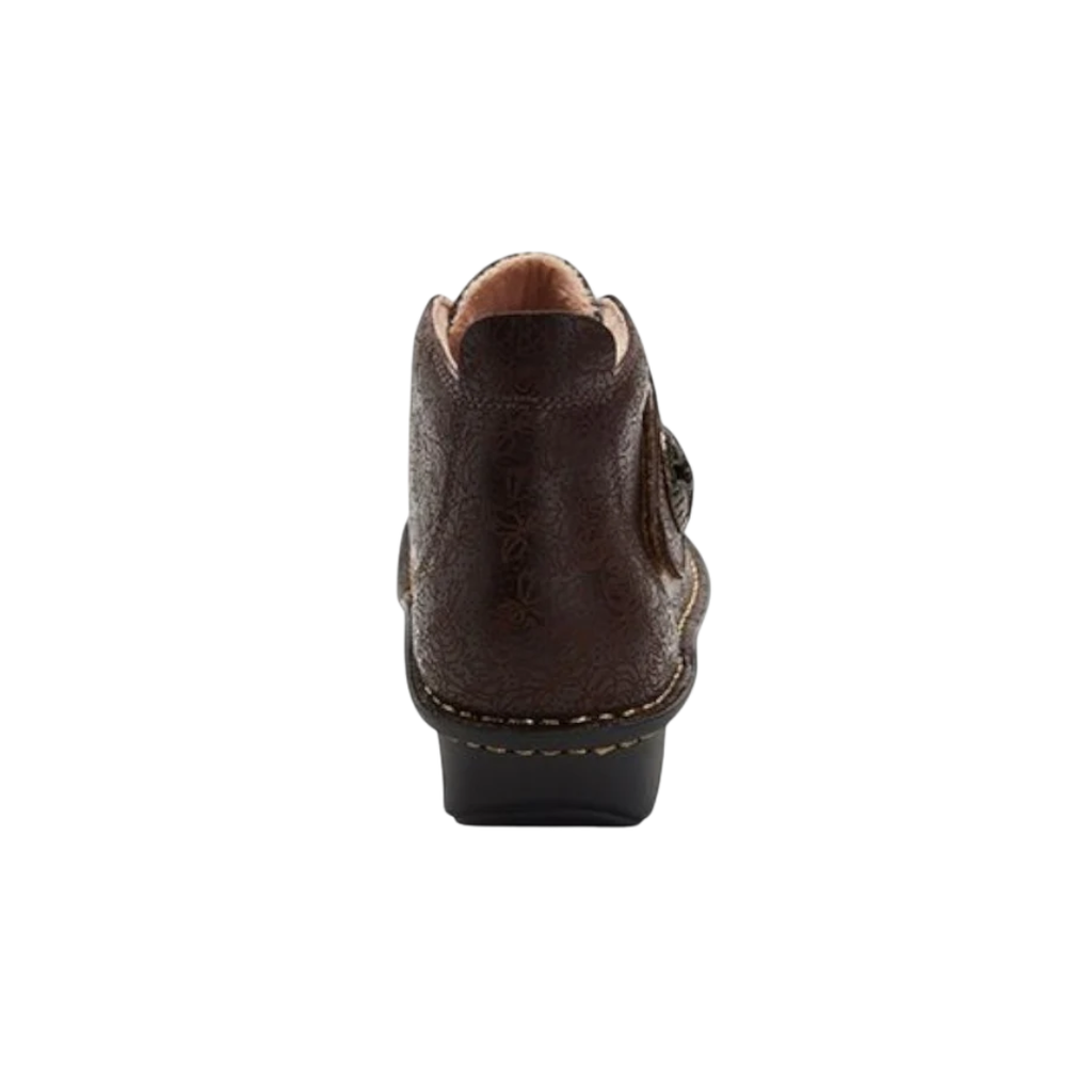 Alegria Women’s Caiti ankle boot in Cocoa Impression rear heel view displaying a structured heel counter, padded ankle support, durable stitched leather construction, and slip-resistant outsole built for dependable traction and stability.