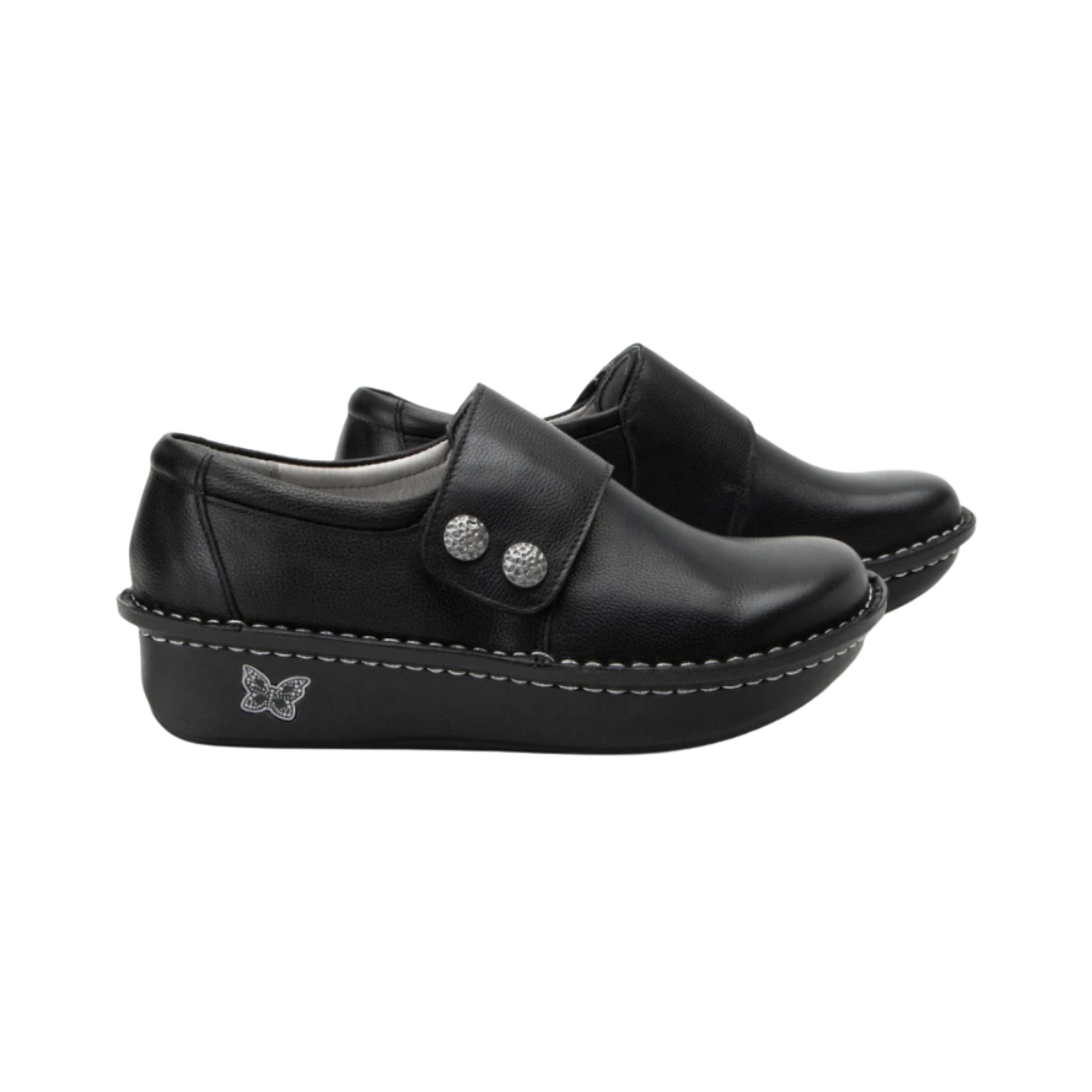 Alegria Women’s Deliah Slip-On Shoe in Upgrade Black side view showcasing the smooth leather upper, double elastic side gores, padded heel collar, mild rocker bottom, and slip-resistant outsole designed for professional style and all-day comfort.