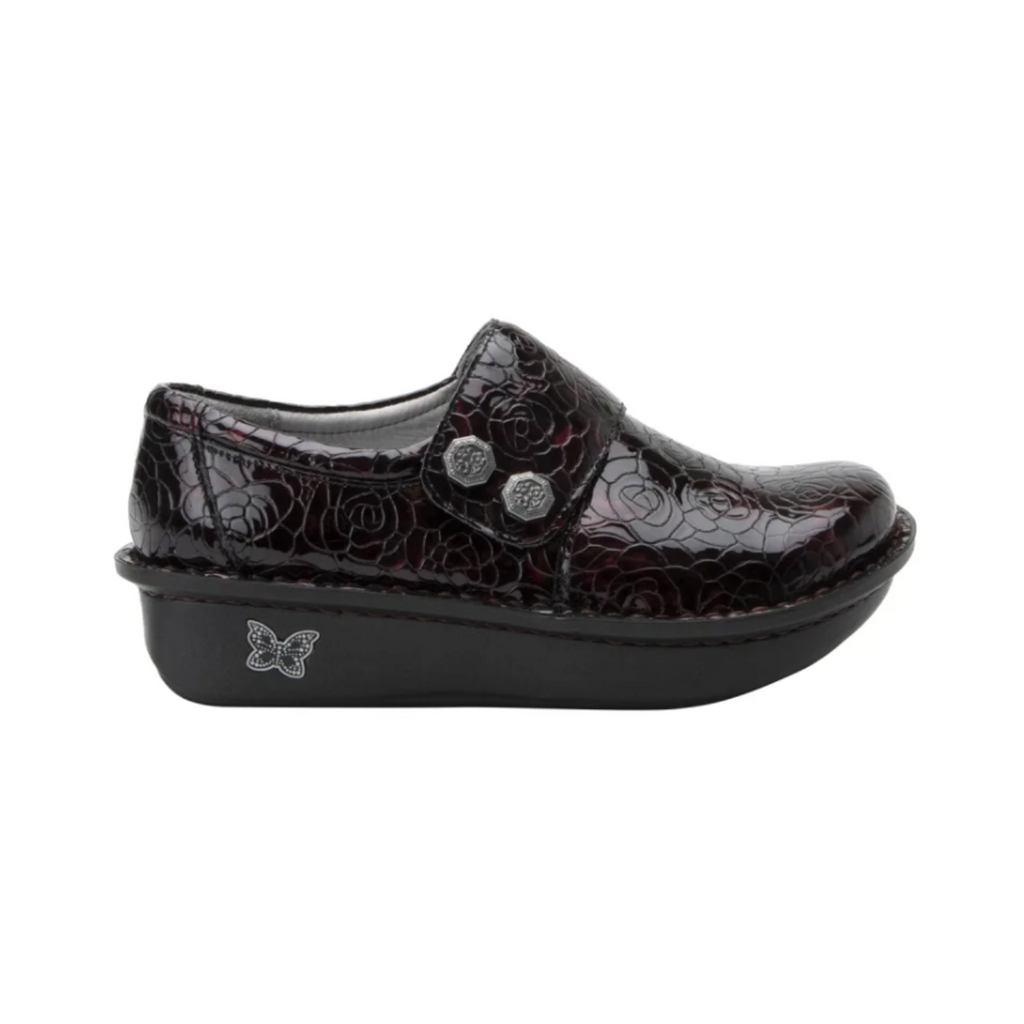 Side view of the Women’s Alegria Deliah in Winery, highlighting the smooth leather upper, double elastic side gores, and sleek slip-on design for all-day comfort.