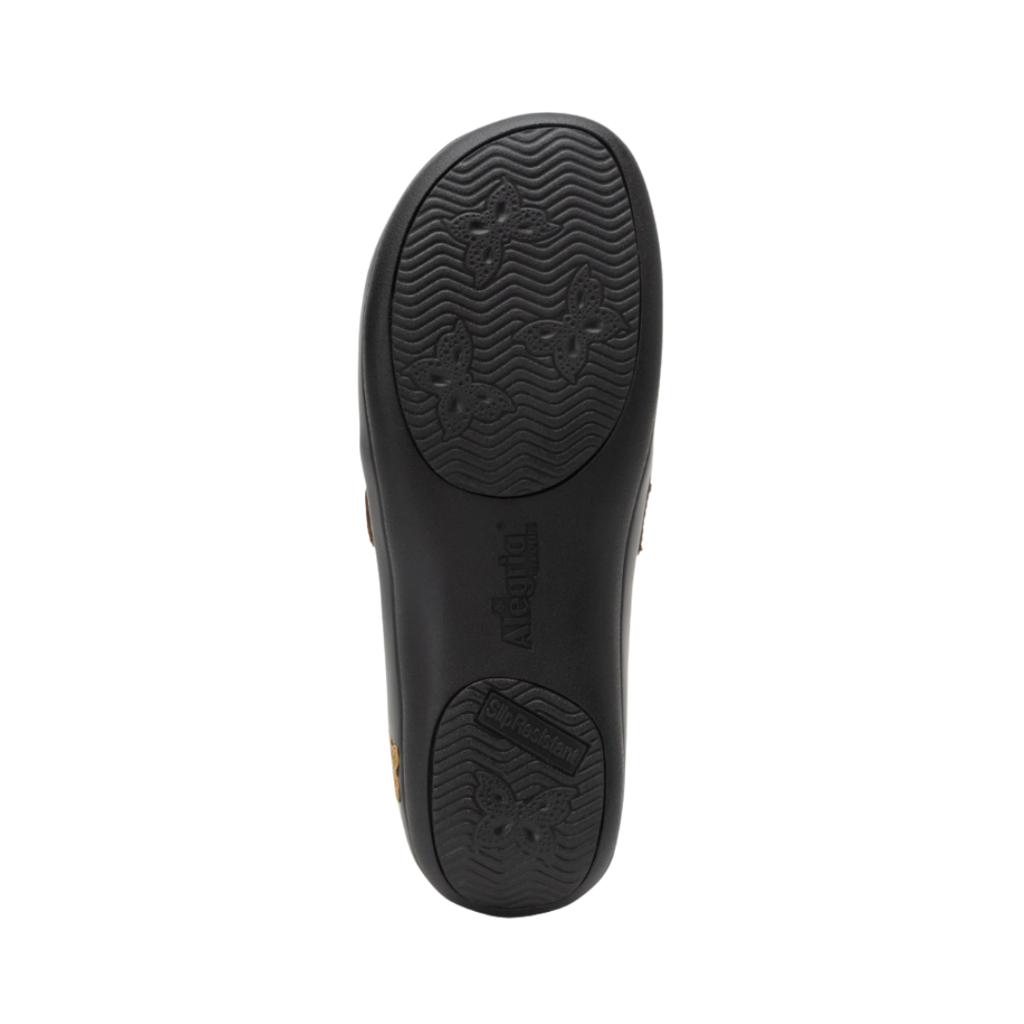 Alegria Women’s Joleen Slip-On Shoe in Oiled Brown bottom view featuring the slip-resistant mild rocker outsole designed to encourage natural walking motion, improve traction, and help reduce pressure on feet and joints throughout the day.
