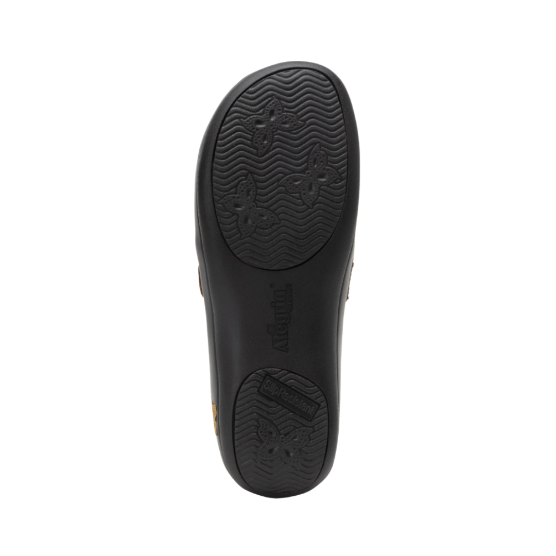 Alegria Women’s Joleen Slip-On Shoe in Oiled Brown bottom view featuring the slip-resistant mild rocker outsole designed to encourage natural walking motion, improve traction, and help reduce pressure on feet and joints throughout the day.