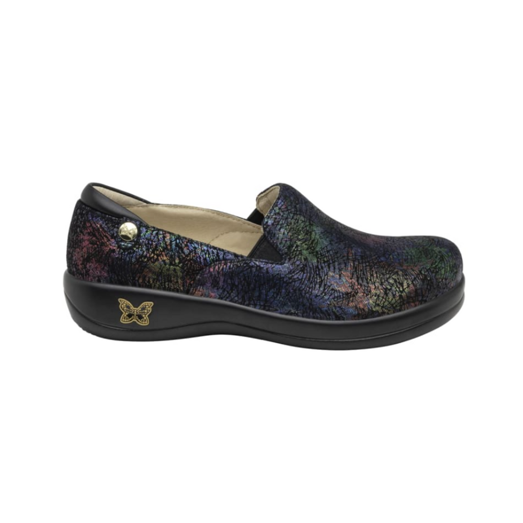 Side view of the Women’s Alegria Keli in Dynomite, highlighting the stain-resistant leather upper, mild rocker sole for natural motion, and slip-resistant outsole designed for long hours on your feet.