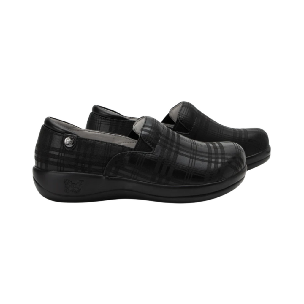Side view of the Women’s Alegria Keli in Plaid to Meet You, highlighting the stain-resistant leather upper, mild rocker sole for natural motion, and slip-resistant outsole designed for long hours on your feet.