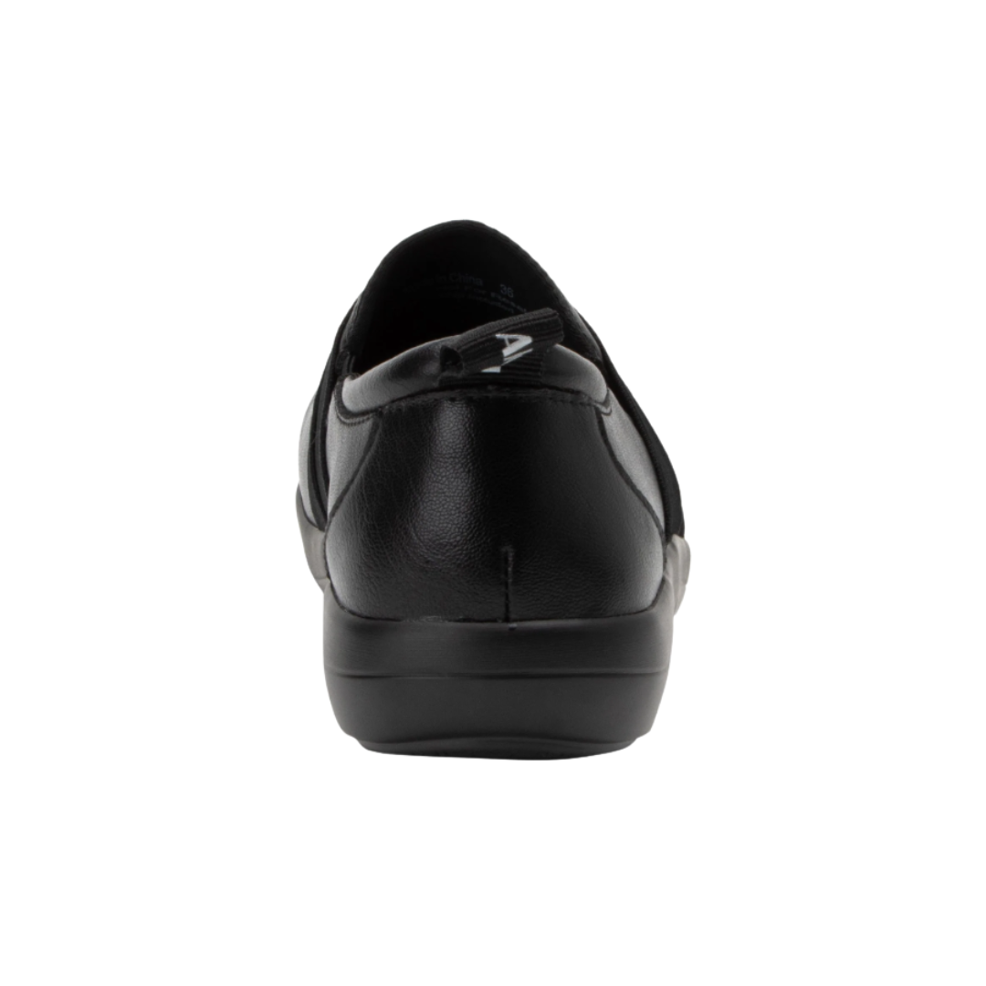 Alegria Women’s Savvie Slip-On Shoe in Black Smooth rear heel view displaying the supportive heel structure, breathable lining, durable leather construction, and lightweight slip-resistant outsole designed for stability and reduced foot fatigue.