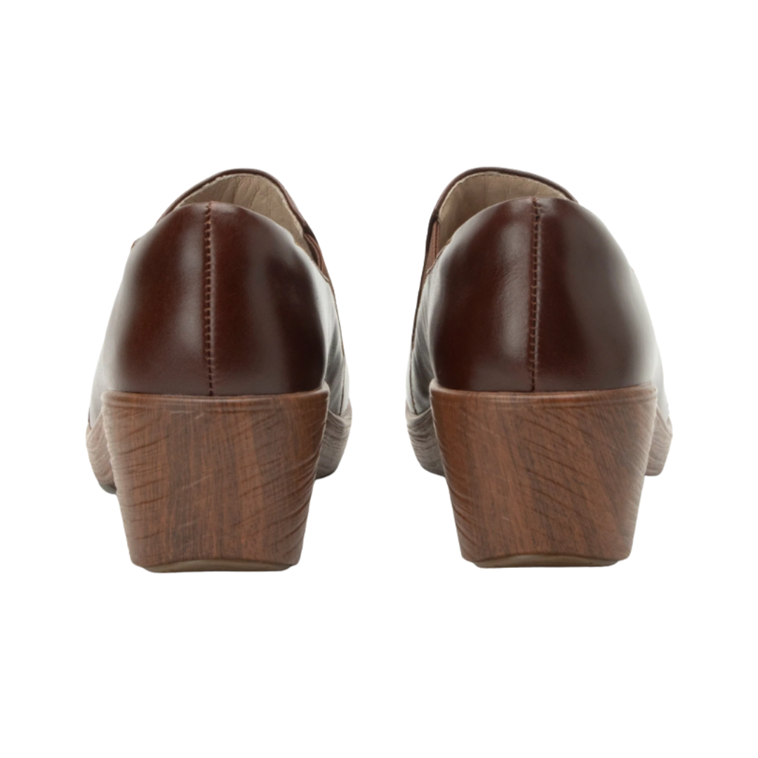 Alegria Women’s Skylar Slip-On Shoe in Mahogany rear heel view displaying the padded heel collar, supportive heel construction, smooth leather finish, and durable slip-resistant outsole designed to improve stability and reduce irritation during extended wear.