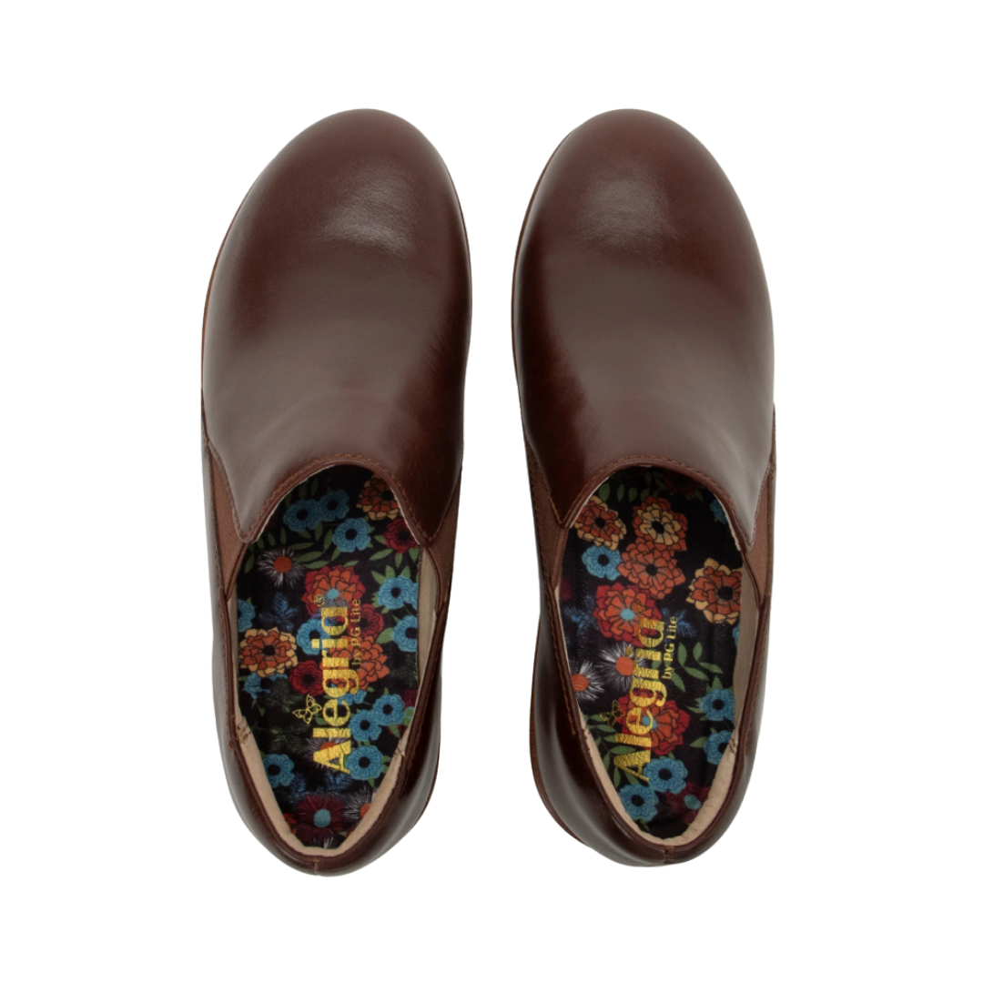 Alegria Women’s Skylar Slip-On Shoe in Mahogany top view showcasing the soft leather upper, convenient slip-on entry, padded collar, spacious foot opening, and removable Alegria signature footbed featuring cork, polyurethane, and memory foam cushioning.