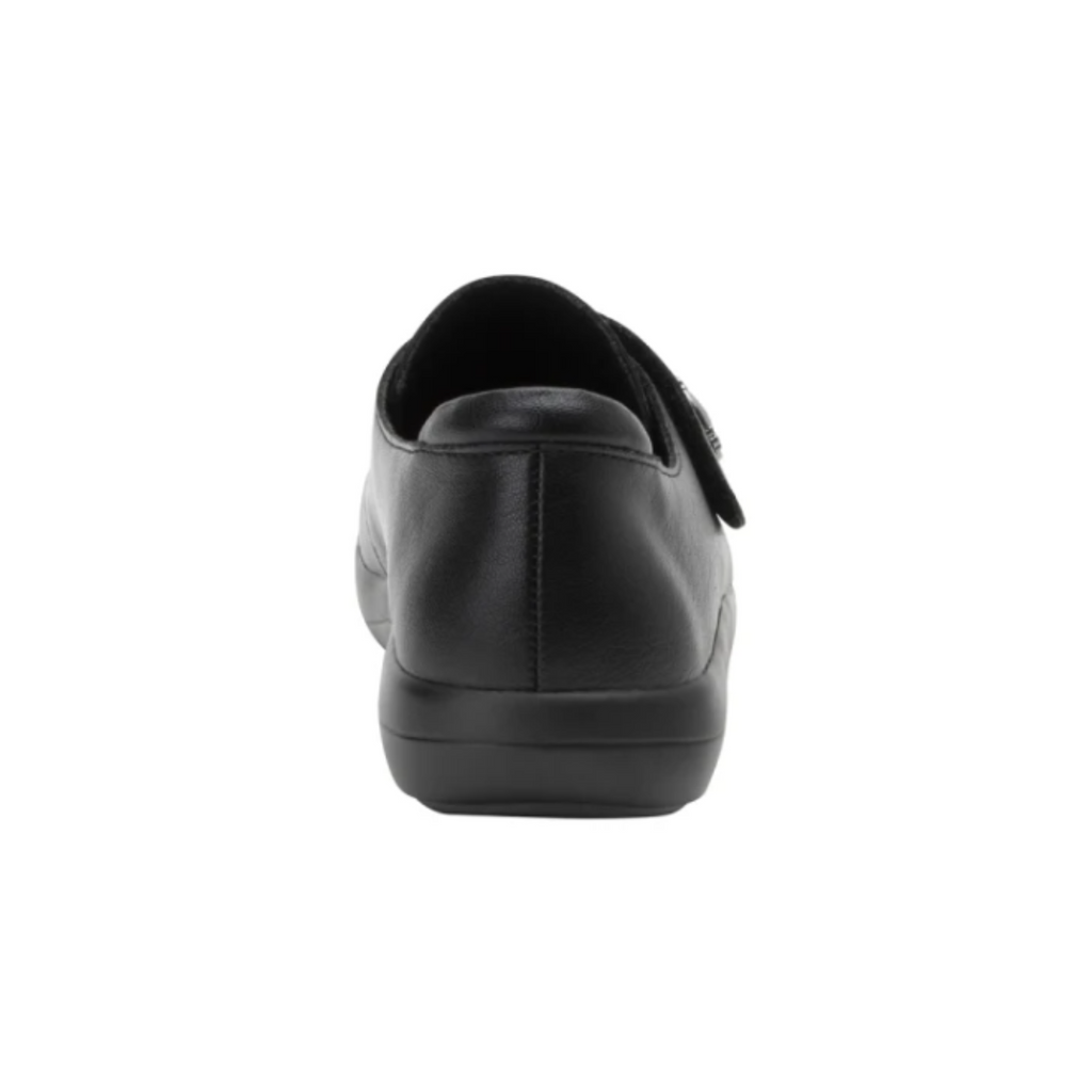 Alegria Women’s Spright Slip-On Shoe in Black Smooth rear heel view displaying the supportive heel structure, soft knit collar, flexible Dream Fit® material, and durable slip-resistant outsole designed for stability and reduced foot fatigue.