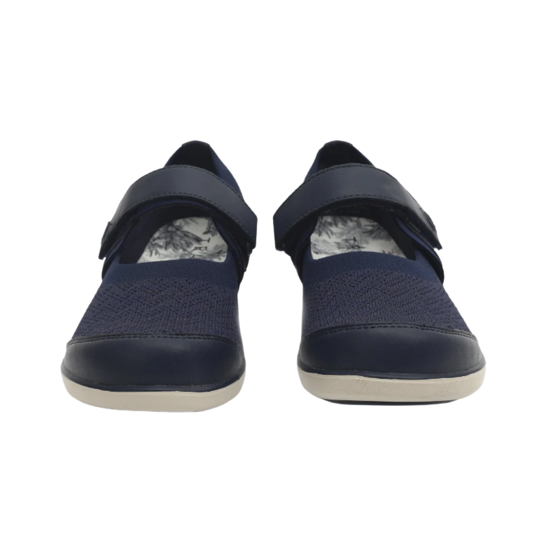 Alegria Women’s TRAQ Qutie Slip-On Shoe in Blue Multi front view highlighting the breathable blue multicolor knit toe box, flexible slip-on design, adjustable strap closure, and rounded athletic profile designed for a comfortable, customized fit.