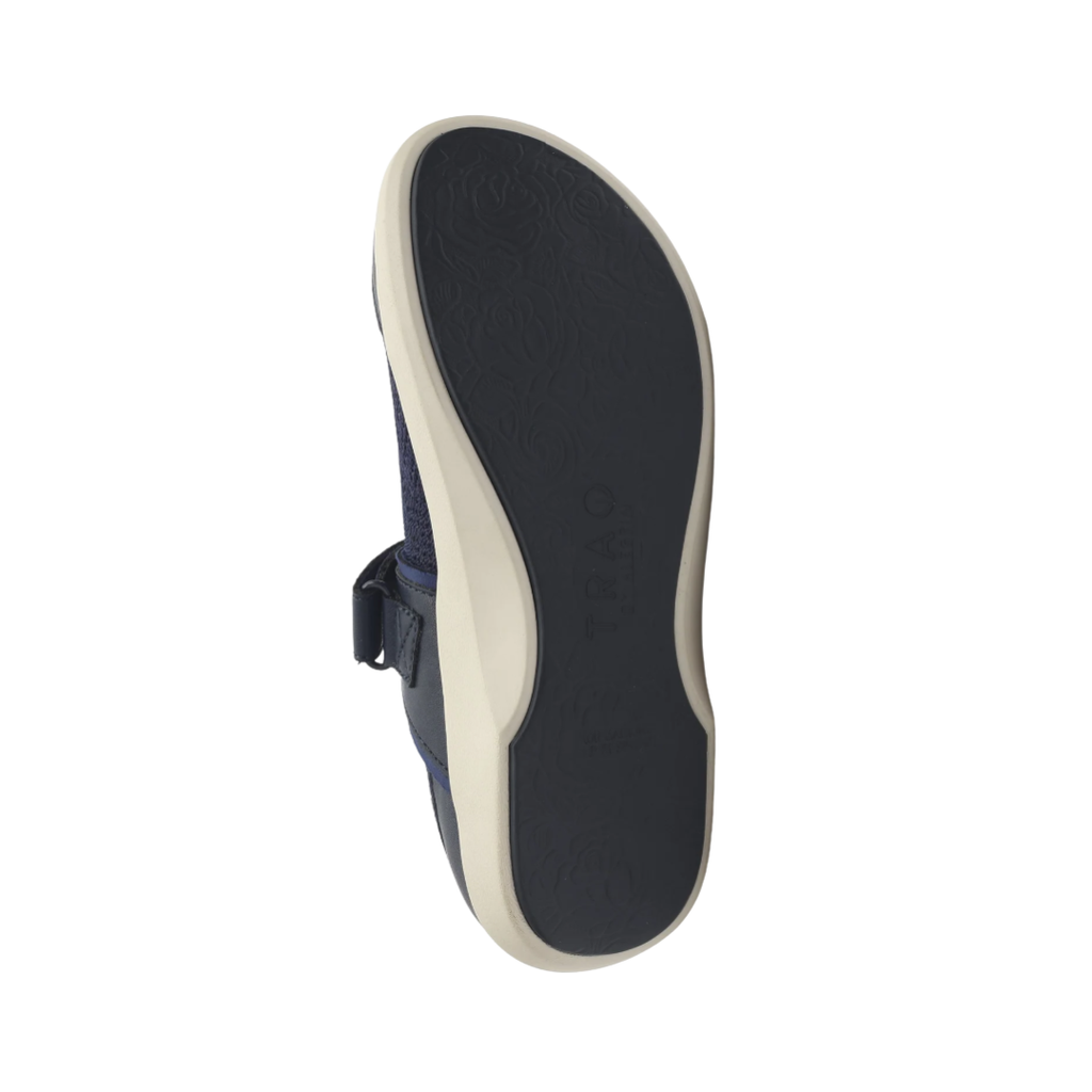 Alegria Women’s TRAQ Qutie Slip-On Shoe in Blue Multi bottom view featuring the slip-resistant Q-Sport rocker outsole with durable traction pattern designed to promote natural walking motion, absorb shock, and reduce pressure on the heels and forefoot.