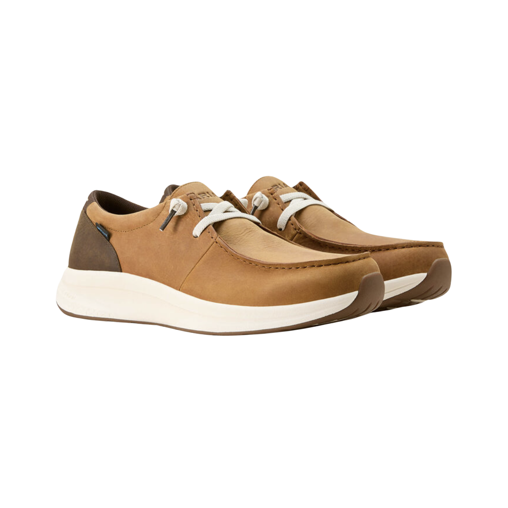 Ariat Men’s Buckeye Waterproof Casual Shoe in Sunset Wheat/Dark Coffee side view showcasing the premium two-tone leather upper, Waterproof PRO™ construction, elastic gore entry, shock-absorbing EVA midsole, and slip-resistant rubber outsole designed for all-day comfort, durability, and versatile everyday wear.