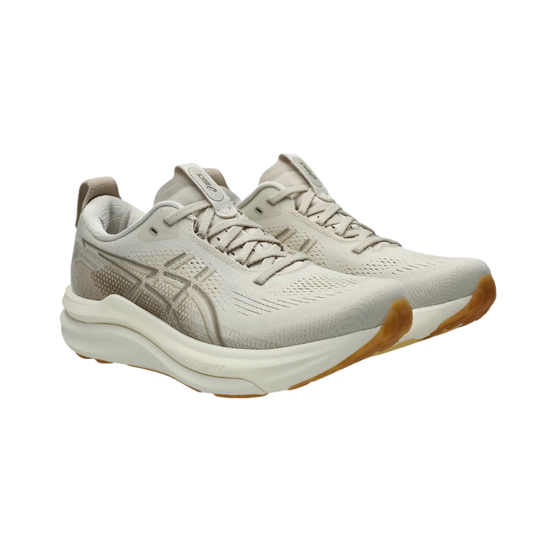 Side view of the Women's ASICS Gel-Kayano 33 in Oatmeal/Cream, featuring a breathable engineered mesh upper, FF BLAST™ MAX and FF BLAST™ PLUSH cushioning, FLUIDSUPPORT™ technology, and a durable HYBRID ASICSGRIP™ outsole.