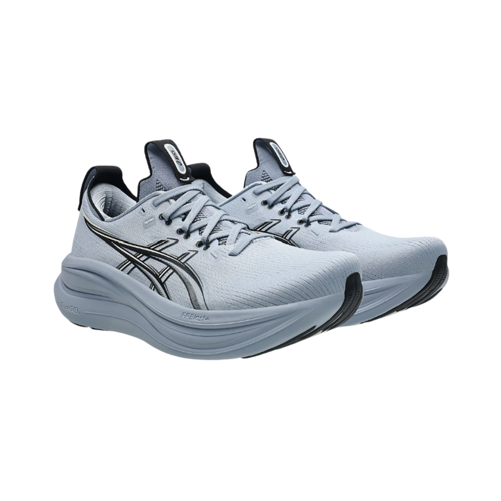 Side view of the Men's ASICS Gel-Nimbus 28 in Grey Blue/Black, featuring an engineered knit upper, FF BLAST™ PLUS cushioning, PureGEL™ technology, and HYBRID ASICSGRIP™ outsole for a smooth, cushioned ride.