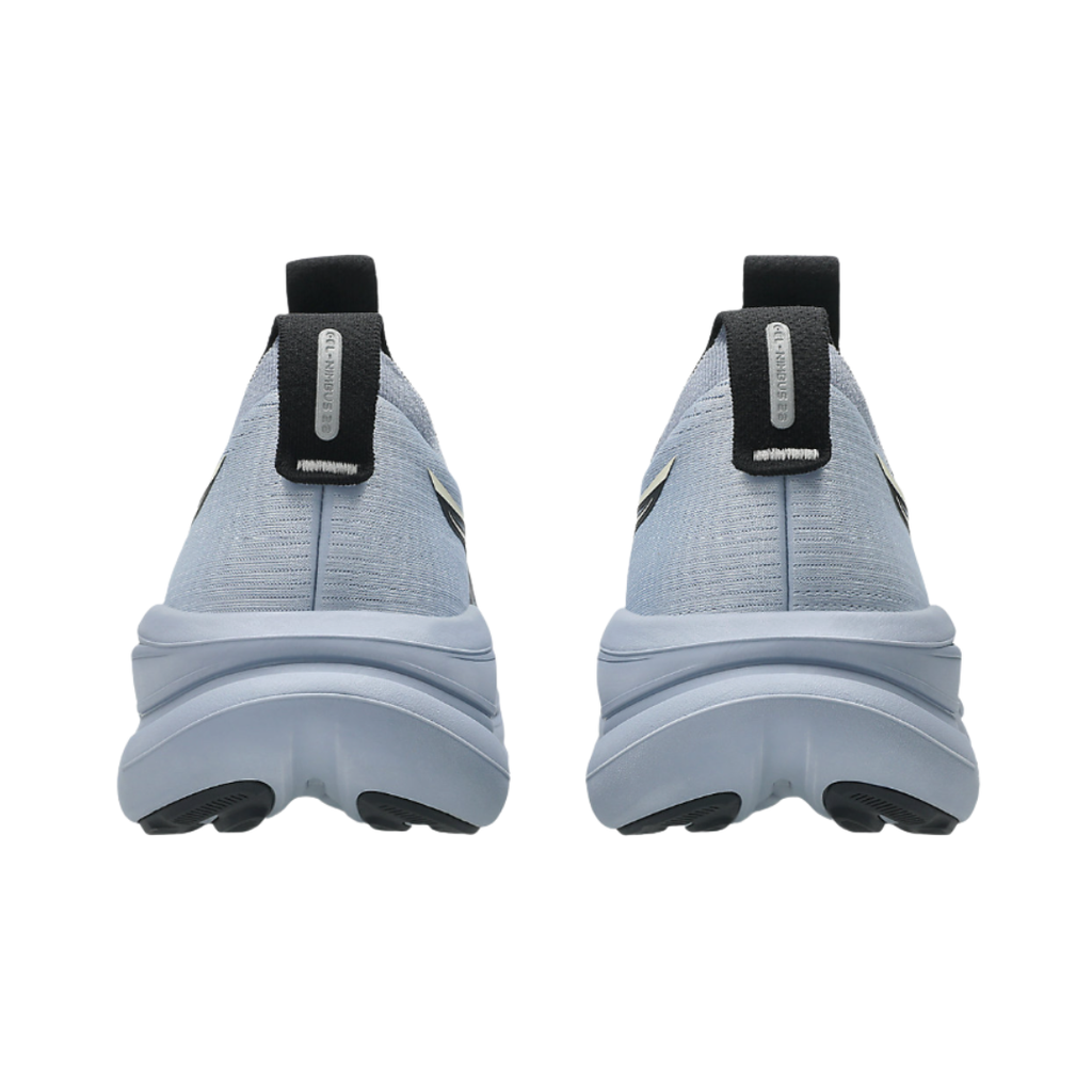 Heel view of the Men's ASICS Gel-Nimbus 28 in Grey Blue/Black, highlighting the cushioned heel construction, supportive fit, and reflective details designed to improve visibility in low-light conditions.