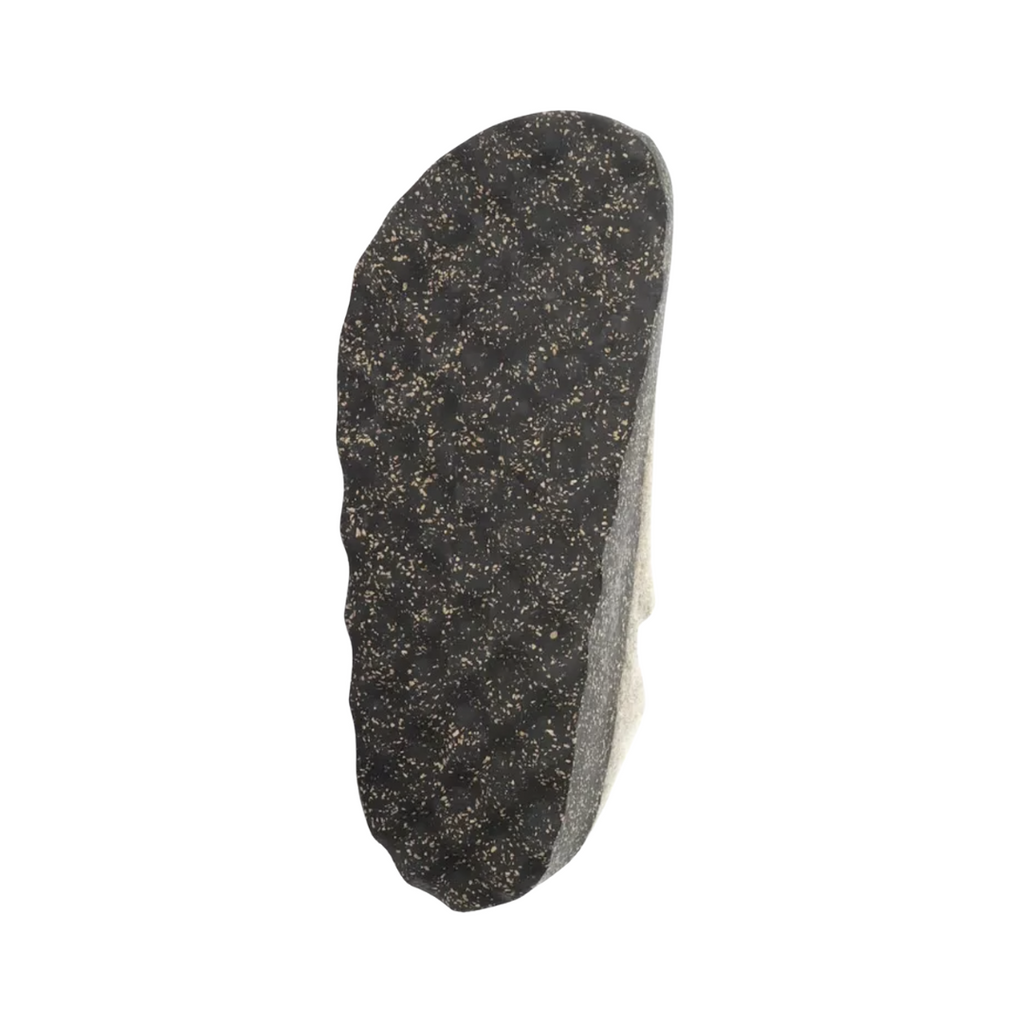 Bottom view of the Asportuguesas Women’s City Slip-On Shoe in Taupe Tweed, highlighting the cork and rubber outsole for lightweight traction, shock absorption, and sustainable design.