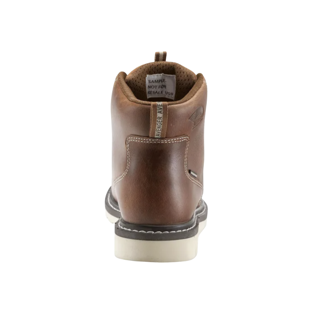 Back heel view of the Avenger Men’s Wedge Moc Carbon Nano Toe Boot in Tobacco highlighting the supportive heel structure, durable Goodyear welt construction, reinforced leather upper, and stable wedge outsole designed for lasting wear and reduced fatigue.