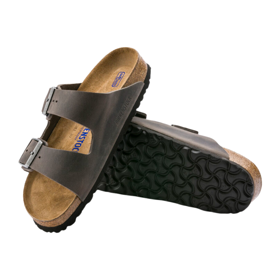 Top/bottom view of the Birkenstock Unisex Arizona Soft Footbed in Iron Oiled Leather, displaying both the cushioned cork-latex soft footbed with suede lining and the flexible EVA outsole for supportive, shock-absorbing comfort.