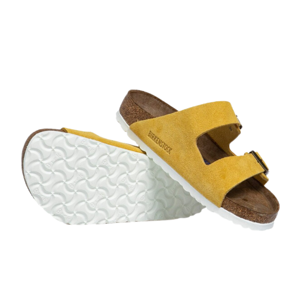 Top and bottom view of the Birkenstock Arizona Soft Footbed in Ochre Suede Leather displaying the premium suede leather upper, adjustable dual buckle straps, breathable suede footbed lining, anatomically shaped cork-latex Soft Footbed with arch and heel support, and lightweight EVA outsole designed for flexibility, traction, and support for conditions such as plantar fasciitis, flat feet, metatarsalgia, heel spurs, overpronation, and general foot fatigue.