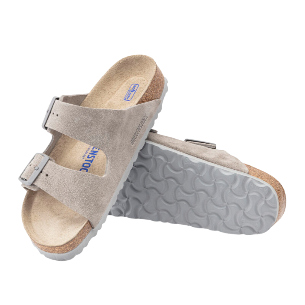 Top/bottom view of the Birkenstock Women’s Arizona Soft Footbed Suede Leather in Stone Coin, displaying both the cushioned, anatomically shaped footbed with arch and heel support and the durable, flexible EVA outsole for stability, comfort, and everyday wear.