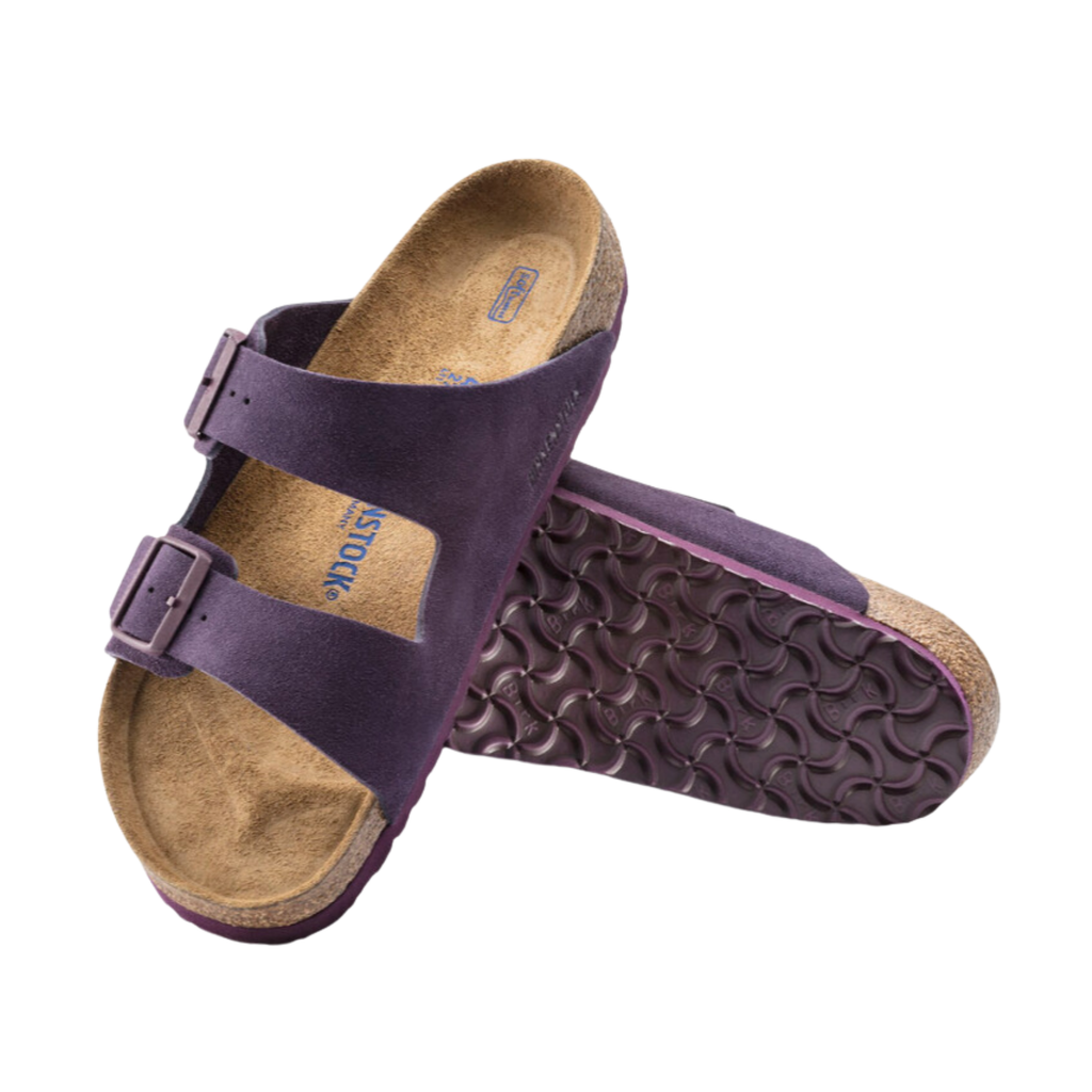Top and bottom view of the Birkenstock Arizona in Wine Suede Leather displaying the premium suede leather upper, adjustable dual buckle straps, anatomically shaped cork-latex footbed with arch support, deep heel cup, raised toe bar, and lightweight EVA outsole designed for flexibility, traction, and support for conditions such as plantar fasciitis, flat feet, heel spurs, overpronation, metatarsalgia, and general foot fatigue.