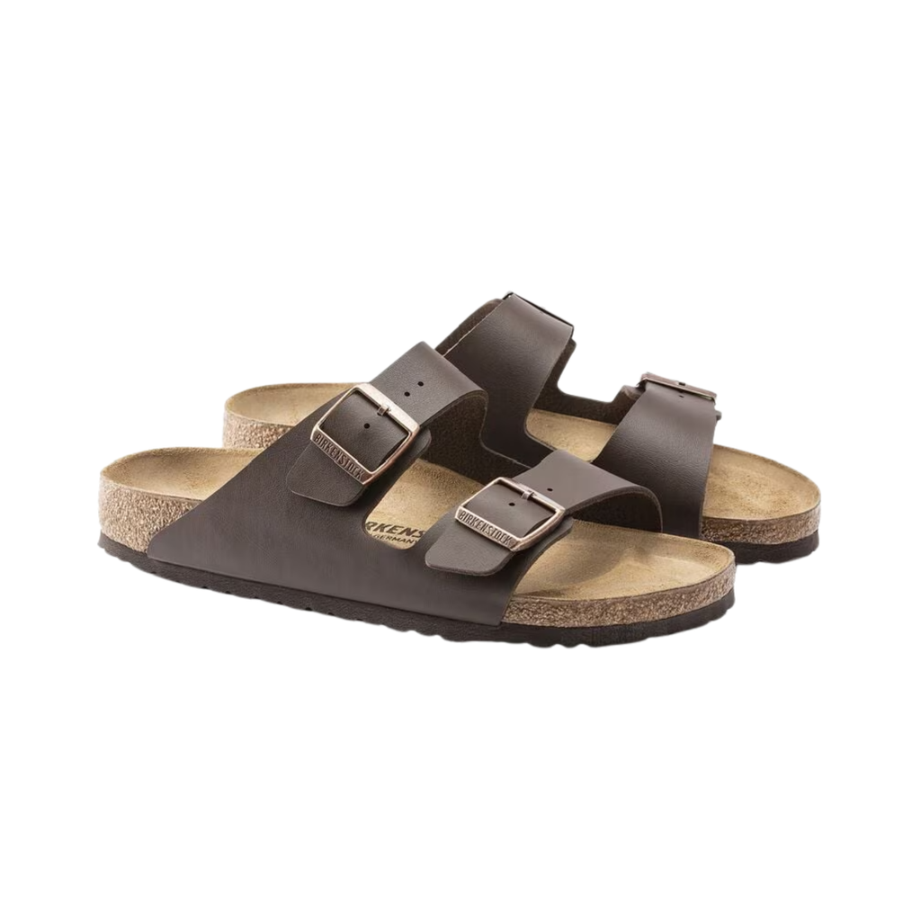 Birkenstock Arizona in Dark Brown Birko-Flor featuring a smooth, durable Birko-Flor upper, iconic dual-strap design with adjustable metal buckles, suede-lined anatomical cork-latex footbed, and lightweight EVA outsole designed for everyday comfort, stability, and long-lasting support.