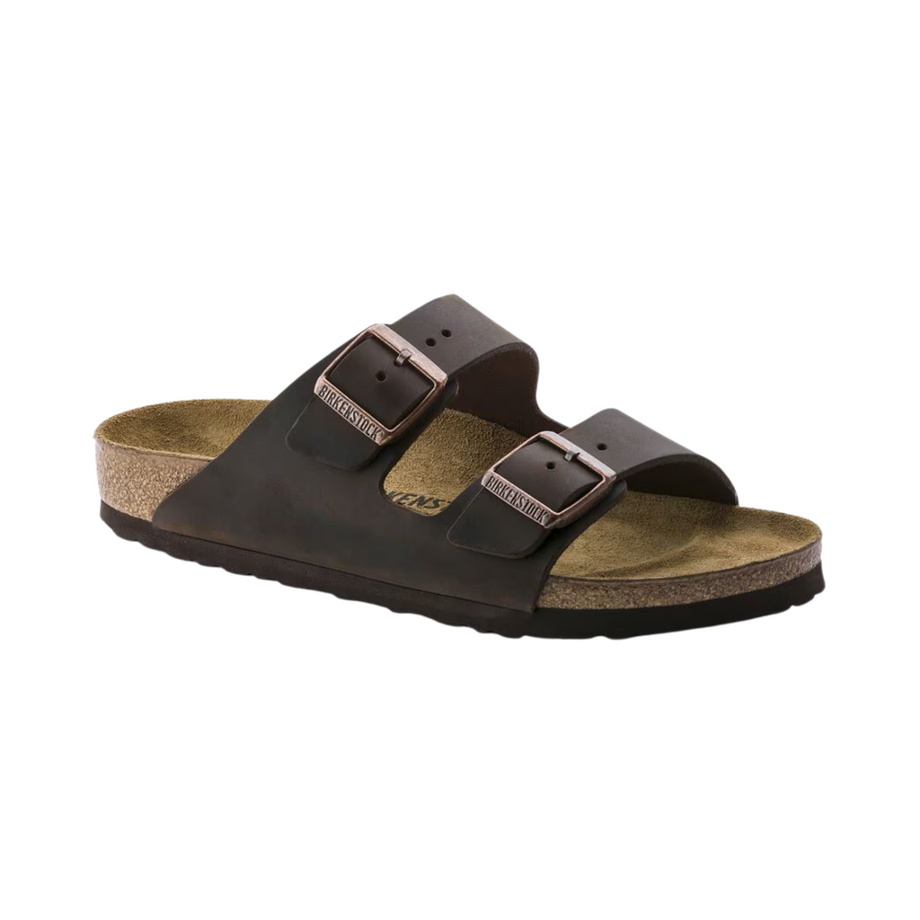 Side view of the Birkenstock Unisex Arizona in Habana Oiled Leather, showing the classic two-strap design, rich oiled leather upper, and anatomically shaped cork-latex footbed for supportive everyday comfort.