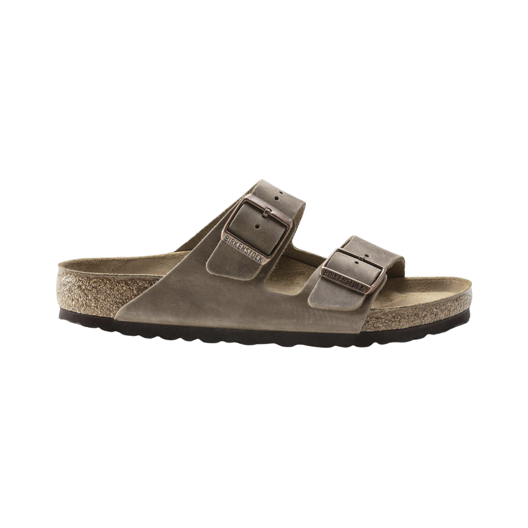 Side view of the Birkenstock Unisex Arizona Soft Footbed in Tobacco Brown Oiled Leather, showing the classic two-strap design, durable oiled leather upper, and contoured cork-latex footbed for supportive everyday comfort.