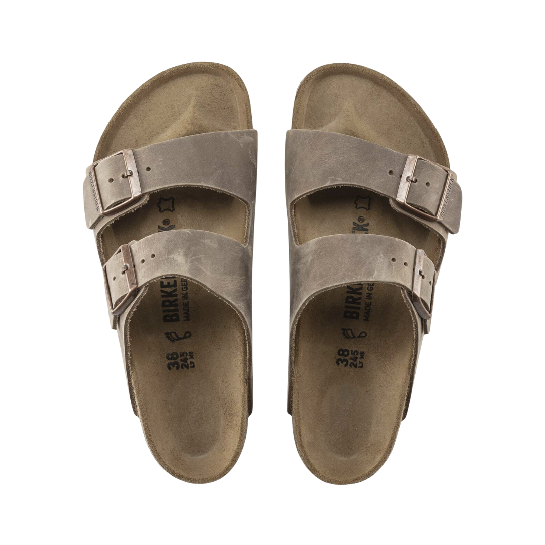 Top view of the Birkenstock Unisex Arizona Soft Footbed in Tobacco Brown Oiled Leather, showing the suede footbed lining, soft footbed cushioning layer, and adjustable straps for a personalized fit.