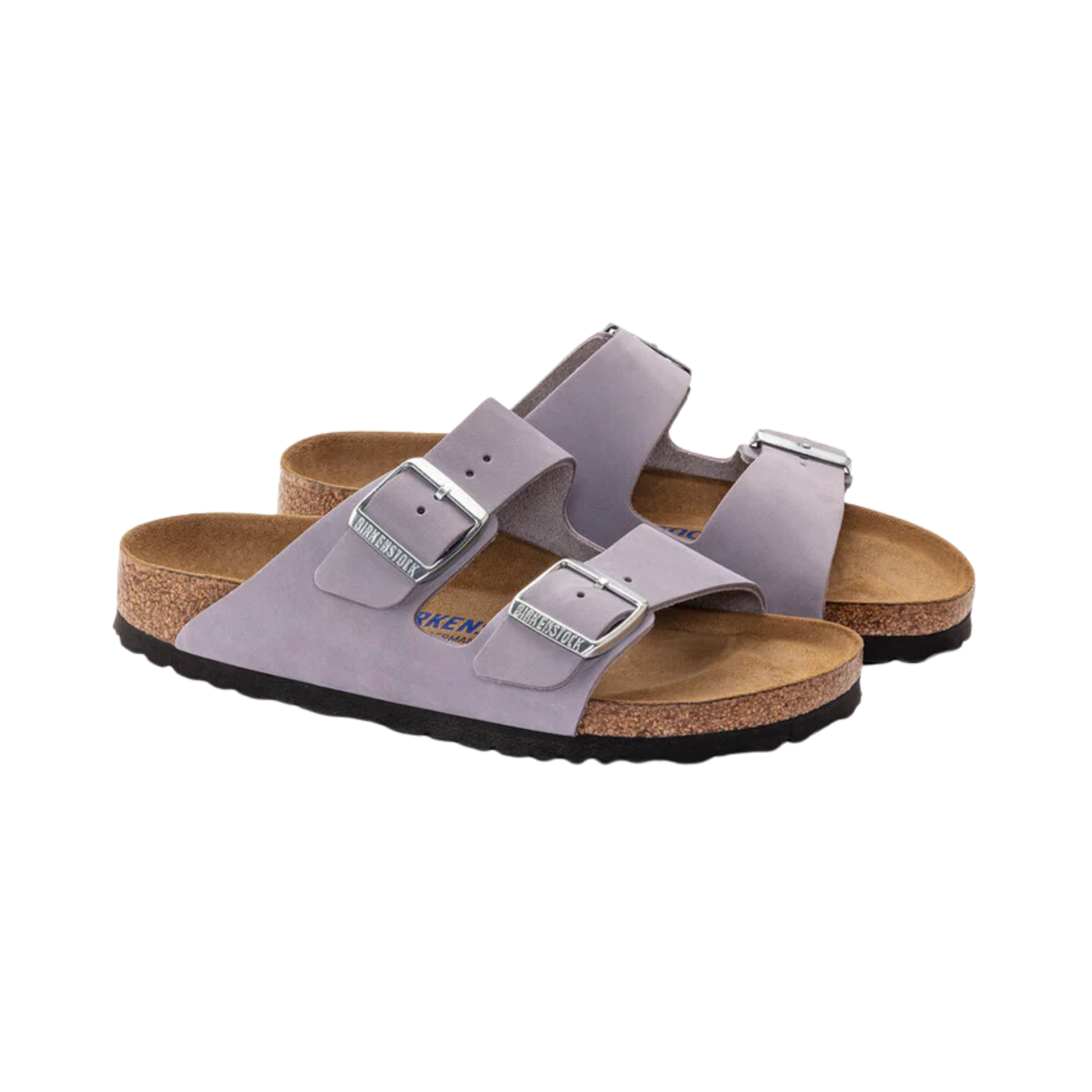 Birkenstock Women’s Arizona Soft Footbed in Purple Fog Nubuck Leather featuring a premium nubuck leather upper in a soft lavender tone, iconic dual-strap design with adjustable metal buckles, cushioned Soft Footbed with added foam layer, suede footbed lining, and lightweight EVA outsole designed for feminine style, everyday comfort, and reliable support.