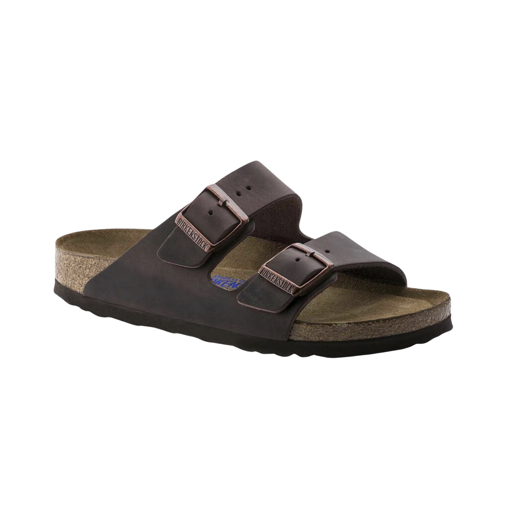 Birkenstock Unisex Arizona in Habana Oiled Leather featuring a premium oiled leather upper with a rich patina finish, iconic dual-strap design with adjustable metal buckles, suede-lined anatomical cork-latex footbed, and lightweight EVA outsole designed for timeless style, comfort, and everyday support.