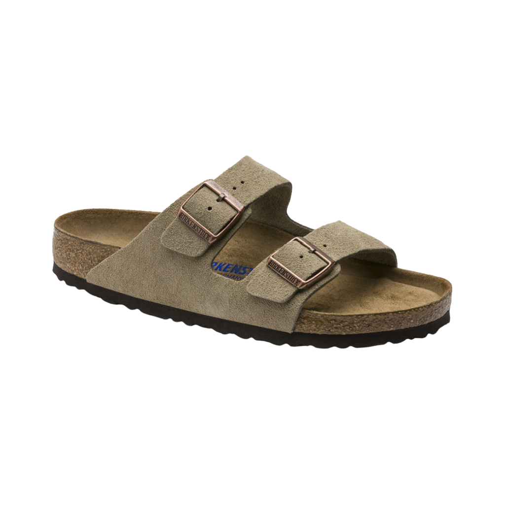 Side view of the Birkenstock Women’s Arizona Soft Footbed Suede Leather in Taupe, showing the dual adjustable straps with metal buckles, soft suede upper, and anatomically shaped cork-latex footbed for customized arch support and comfort.