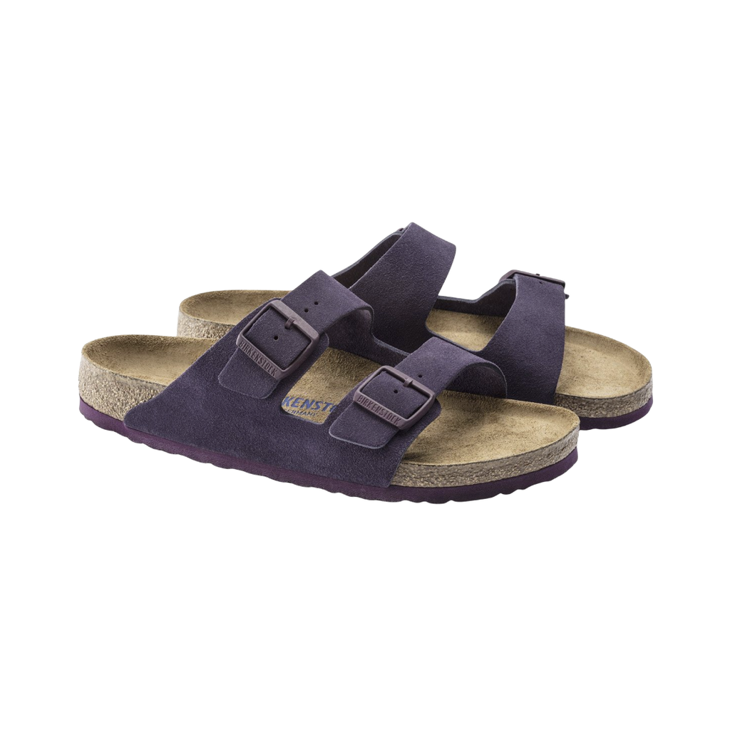 Birkenstock Arizona in Wine Suede Leather featuring a premium suede leather upper in a versatile taupe color, iconic dual-strap design with adjustable metal buckles, anatomically shaped cork-latex footbed, and lightweight EVA outsole designed for timeless style, lasting comfort, and everyday support.