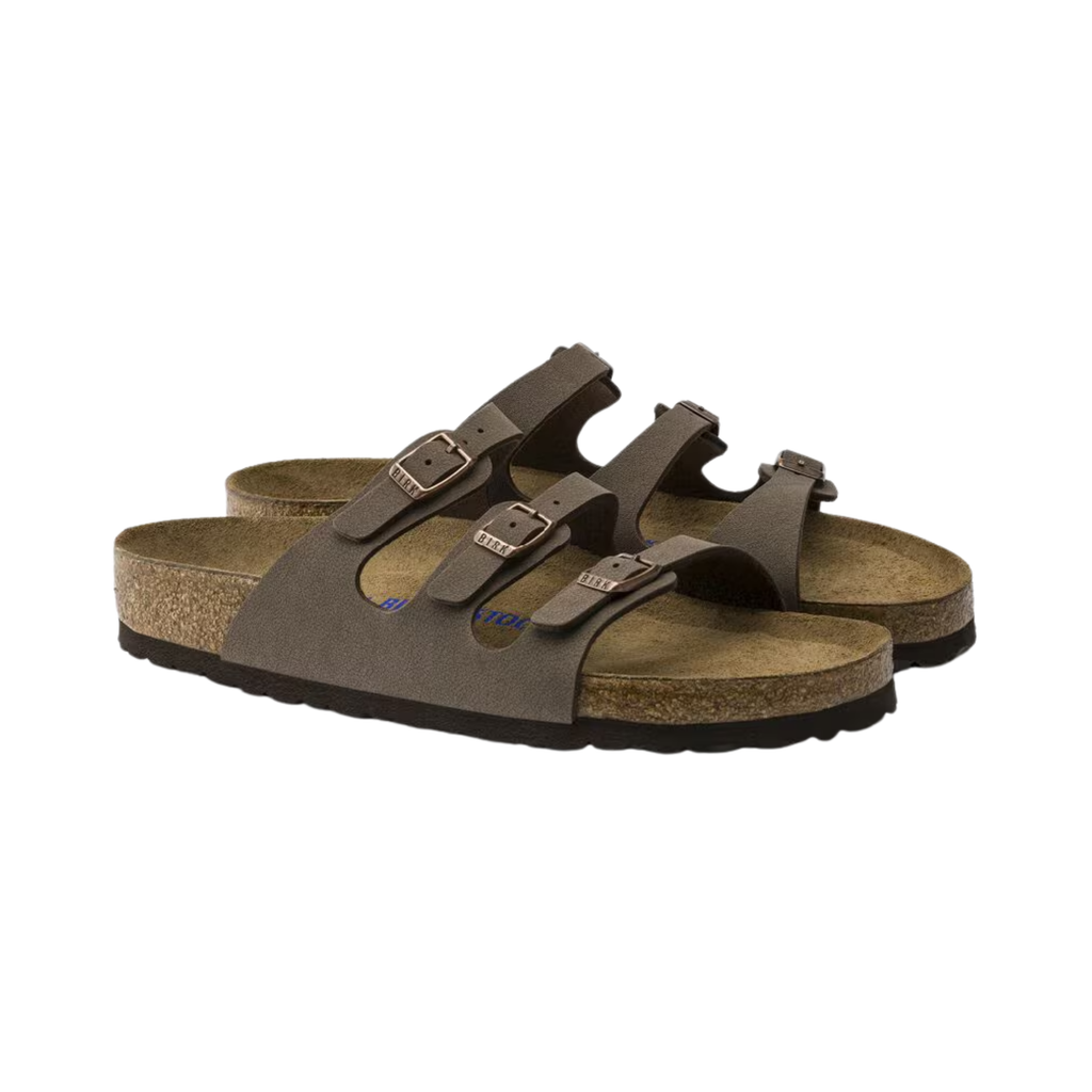 Birkenstock Women’s Florida Soft Footbed in Mocha Birkibuc featuring a premium Birkibuc upper in a warm mocha color, three adjustable straps with metal buckles, cushioned Soft Footbed with an added foam layer, anatomically shaped cork-latex footbed, and lightweight EVA outsole designed for secure comfort, stability, and everyday support.