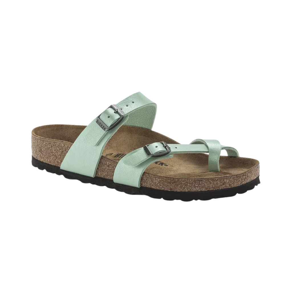Birkenstock Mayari in Graceful Matcha Birko-Flor featuring a durable Birko-Flor upper with a metallic green finish, elegant toe-loop design with crisscrossing adjustable straps, anatomically shaped cork-latex footbed, and lightweight EVA outsole designed for stylish comfort, personalized support, and everyday wear.