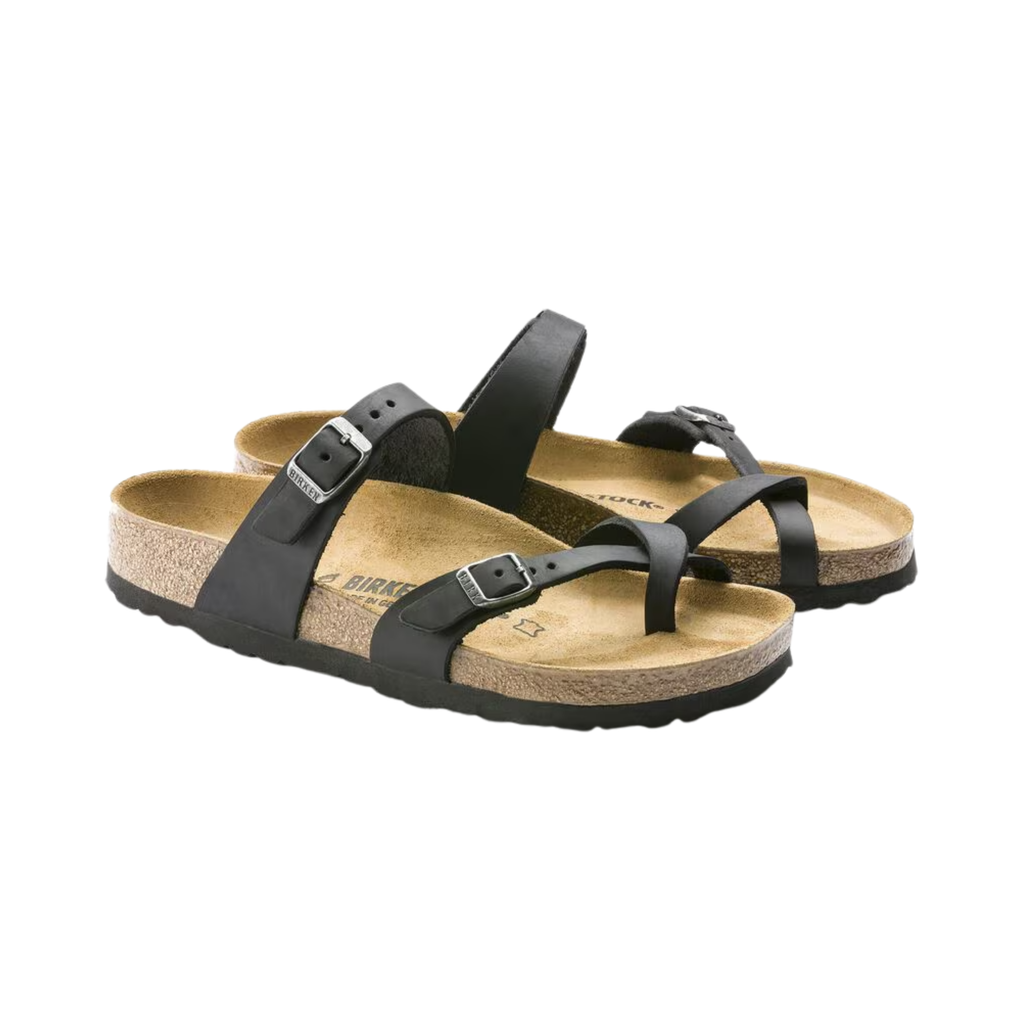 Birkenstock Women’s Mayari in Black Oiled Leather featuring a premium oiled leather upper in a timeless black finish, elegant toe-loop design with crisscross adjustable straps, anatomically shaped cork-latex footbed, and lightweight EVA outsole designed for feminine style, personalized comfort, and everyday support.
