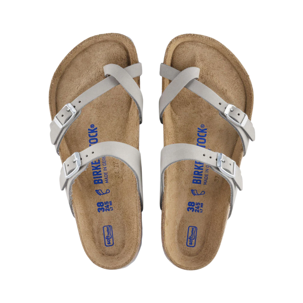 Top view of the Birkenstock Women’s Mayari Soft Footbed in Dove Grey Nubuck Leather displaying the premium nubuck leather upper, elegant toe-loop construction, adjustable crisscross straps with metal buckles, breathable footbed lining, anatomically shaped cork-latex Soft Footbed with arch support and deep heel cup, and lightweight EVA outsole designed for flexibility, traction, and support for conditions such as plantar fasciitis, flat feet, metatarsalgia, bunions, heel spurs, overpronation, and 