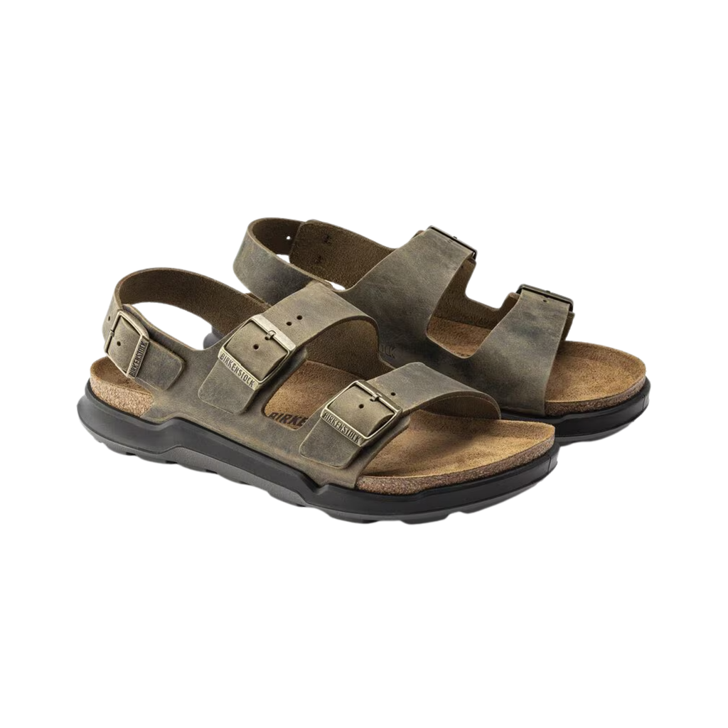 Birkenstock Men’s Milano Rugged in Faded Khaki Oiled Leather featuring a durable oiled leather upper, three-strap design with adjustable metal pin buckles, supportive backstrap, anatomically shaped cork-latex footbed, and rugged EVA outsole designed for stability, comfort, and reliable performance during active wear.