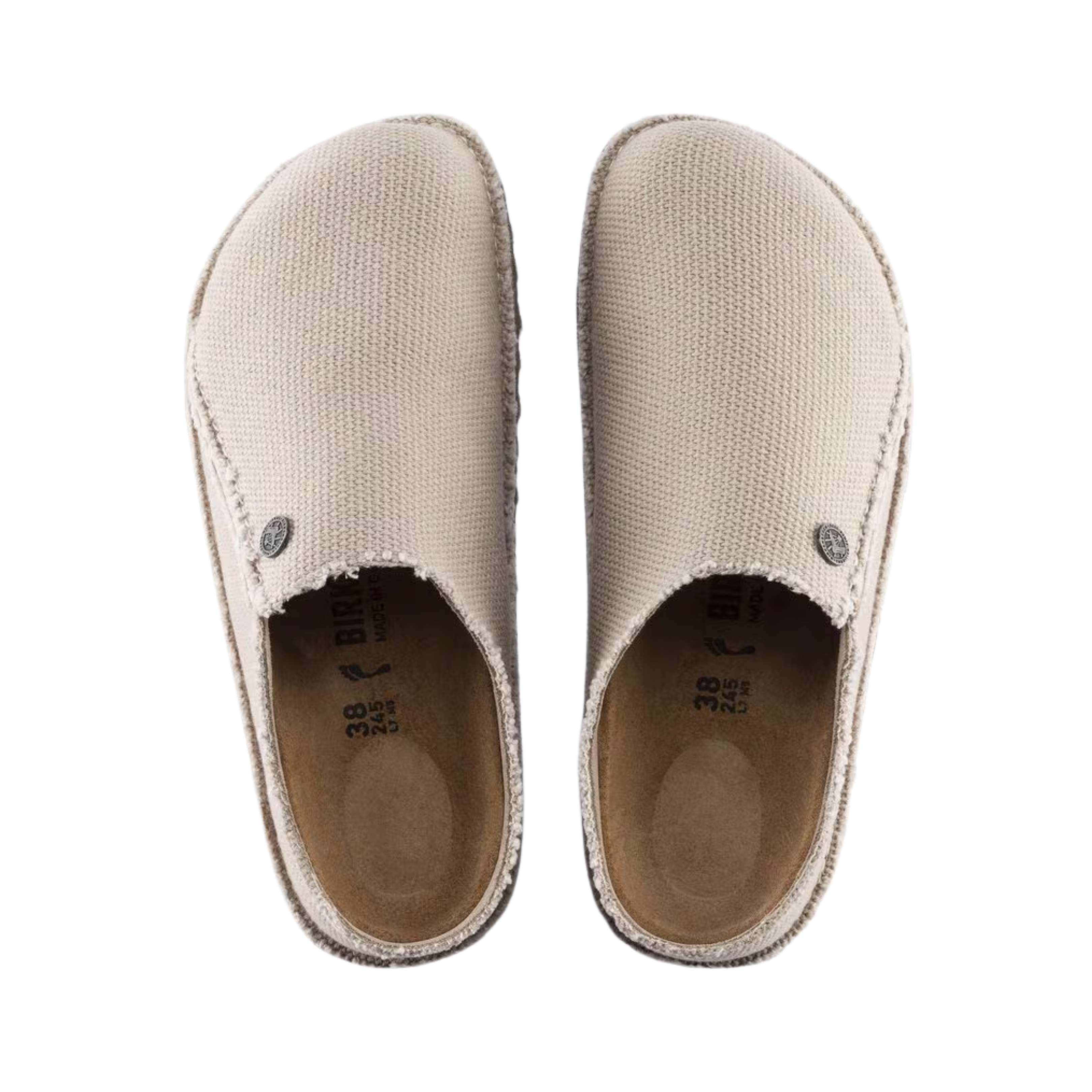 Top view of the Birkenstock Women’s Zermatt Canvas Slipper in Eggshell Textile displaying the breathable textile upper, moisture-wicking interior lining, easy slip-on entry, anatomical cork-latex footbed with arch and heel support, and durable rubber outsole designed for traction, flexibility, and support for conditions such as plantar fasciitis, flat feet, high arches, arthritis, heel spurs, bunions, hammertoes, cold sensitivity, and general foot fatigue.