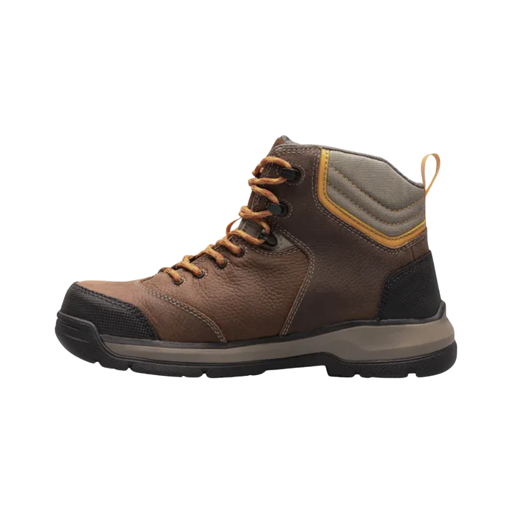BOGS Men’s Bedrock II Mid Composite Toe Boot in Brown featuring a seamless waterproof upper, ASTM-rated composite safety toe, mid-height 6-inch design, Rebound Cushioning Midsole, BioGrip slip-resistant outsole, and lightweight construction designed for demanding work environments including construction, farming, landscaping, and industrial settings.